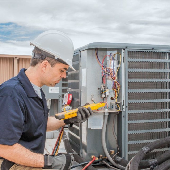 Glencoe Duct Cleaning certified duct cleaning technician on a service call in Glencoe, Ontario